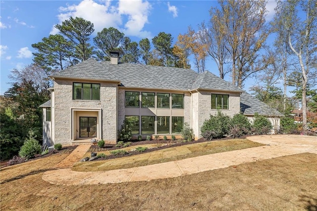 view of front of property with a chimney