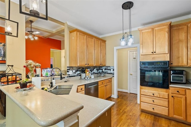 kitchen with a sink, dishwasher, crown molding, black oven, and backsplash