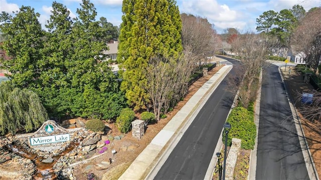 view of street with curbs