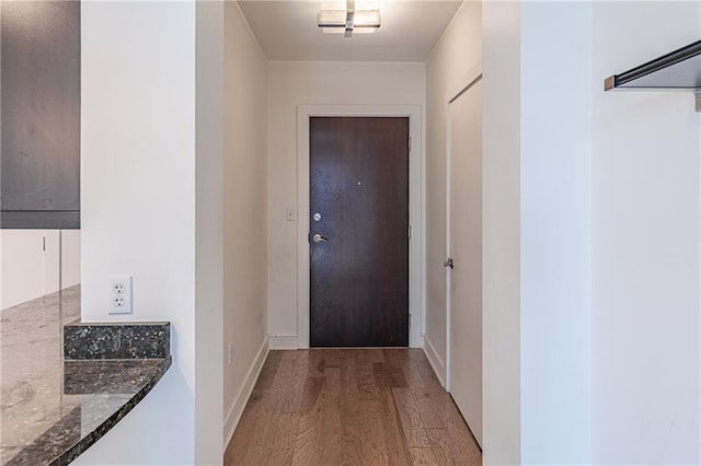 doorway to outside featuring light hardwood / wood-style flooring