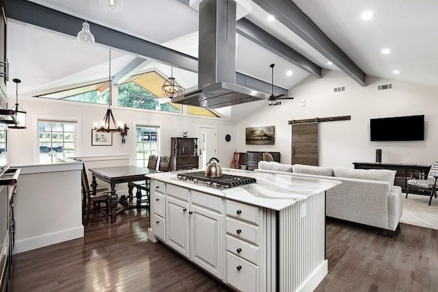 225 Jayne Ellen Way, Alpharetta, GA 30009 - kitchen with stainless steel gas stovetop, a barn door, island exhaust hood, a chandelier, and dark wood-style flooring