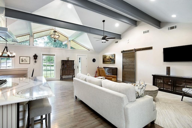 225 Jayne Ellen Way, Alpharetta, GA 30009 - living room with a barn door, a ceiling fan, a chandelier, wood finished floors, and recessed lighting