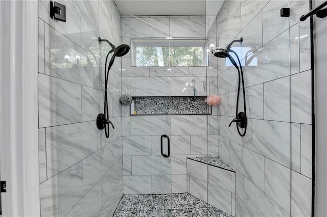 bathroom featuring an enclosed shower