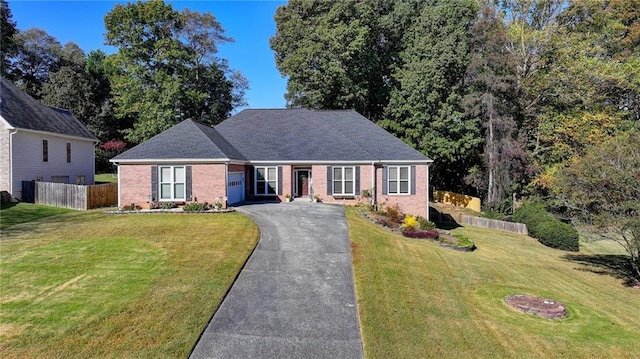 view of front facade with a front lawn