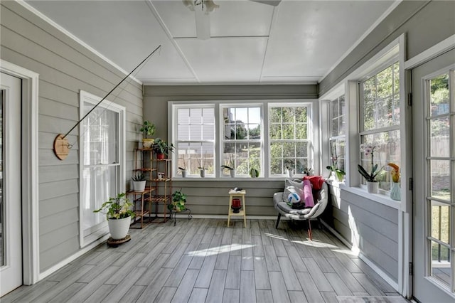 sunroom / solarium featuring plenty of natural light