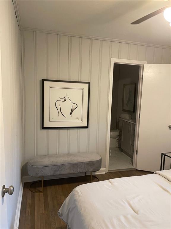 2135 Niskey Lake Rd SW, Atlanta, GA 30331 - bedroom with ensuite bathroom, ceiling fan, and wood finished floors