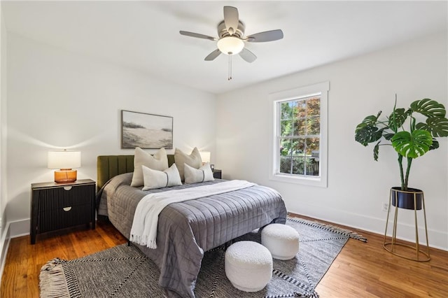 1592 Braeburn Dr SE, Atlanta, GA 30316 - bedroom with wood finished floors, baseboards, and a ceiling fan