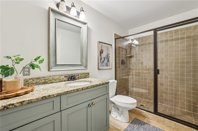 1592 Braeburn Dr SE, Atlanta, GA 30316 - bathroom featuring vanity, toilet, and a shower stall