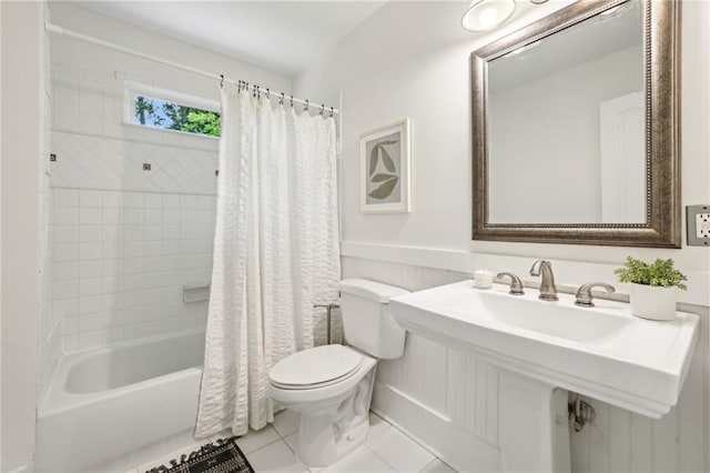 1592 Braeburn Dr SE, Atlanta, GA 30316 - bathroom featuring toilet, tile patterned floors, and shower / bathtub combination with curtain