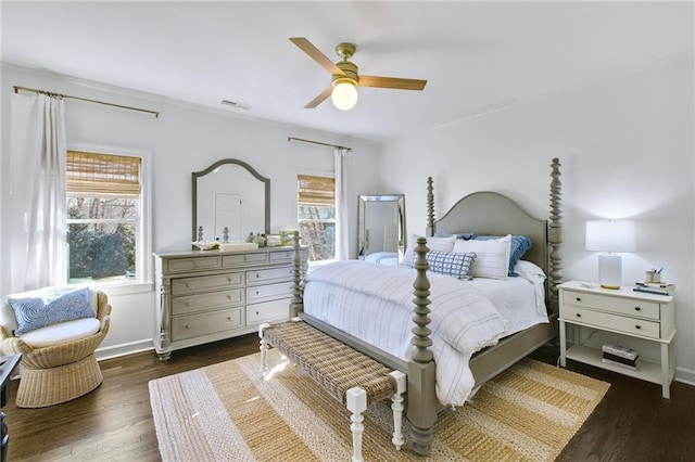 bedroom with dark wood-type flooring and ceiling fan