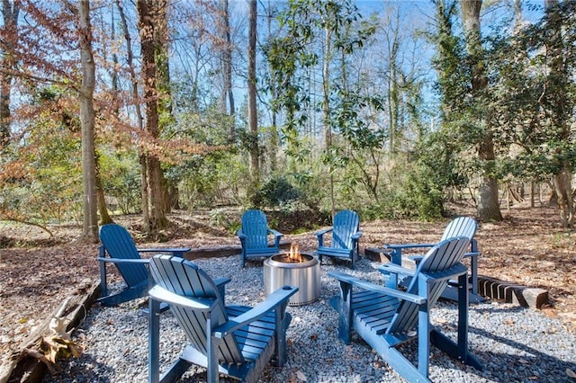 view of patio with an outdoor fire pit