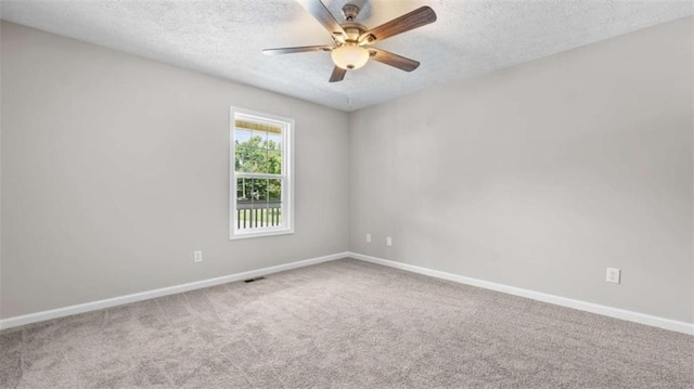 35 Ravenwood Dr, Rockmart, GA 30153 - carpeted spare room with a textured ceiling and ceiling fan