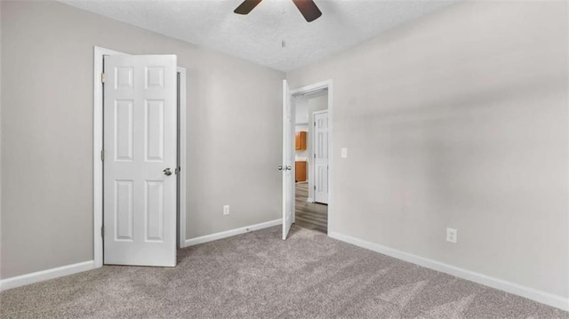 35 Ravenwood Dr, Rockmart, GA 30153 - unfurnished bedroom featuring carpet and a ceiling fan