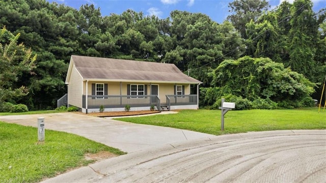 35 Ravenwood Dr, Rockmart, GA 30153 - view of front of property with a porch, driveway, and a front yard
