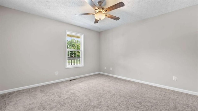 35 Ravenwood Dr, Rockmart, GA 30153 - unfurnished room featuring carpet floors, a textured ceiling, and ceiling fan