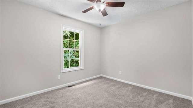 35 Ravenwood Dr, Rockmart, GA 30153 - unfurnished room featuring carpet flooring, ceiling fan, and a textured ceiling