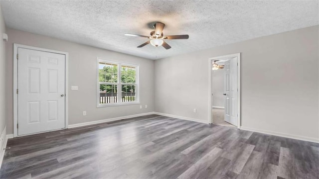 35 Ravenwood Dr, Rockmart, GA 30153 - spare room featuring a ceiling fan, a textured ceiling, and dark wood finished floors