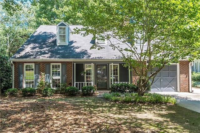 402 Roswell Green Ln, Roswell, GA 30075 - new england style home featuring brick siding, driveway, and a garage