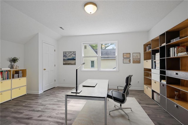 402 Roswell Green Ln, Roswell, GA 30075 - home office featuring dark wood-type flooring, baseboards, and a textured ceiling