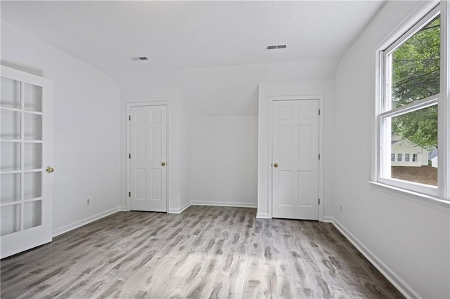 402 Roswell Green Ln, Roswell, GA 30075 - unfurnished room with wood finished floors and baseboards