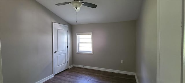 2917 Joe Jerkins Blvd, Austell, GA 30106 - spare room with lofted ceiling, baseboards, dark wood-style floors, and ceiling fan