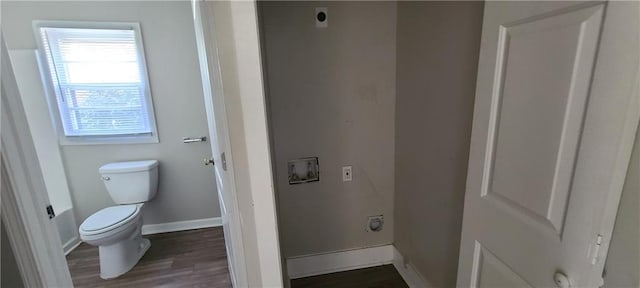 2917 Joe Jerkins Blvd, Austell, GA 30106 - bathroom featuring baseboards, wood finished floors, and toilet