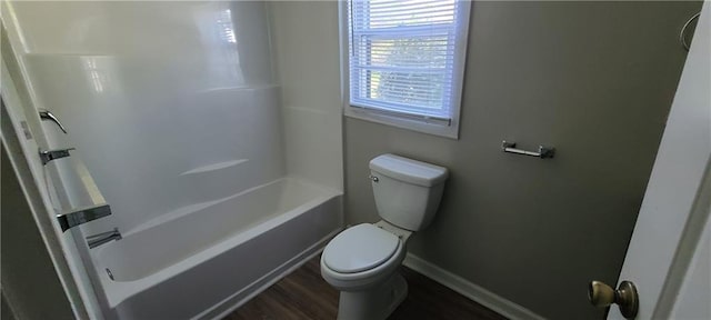 2917 Joe Jerkins Blvd, Austell, GA 30106 - bathroom featuring wood finished floors, baseboards, and toilet