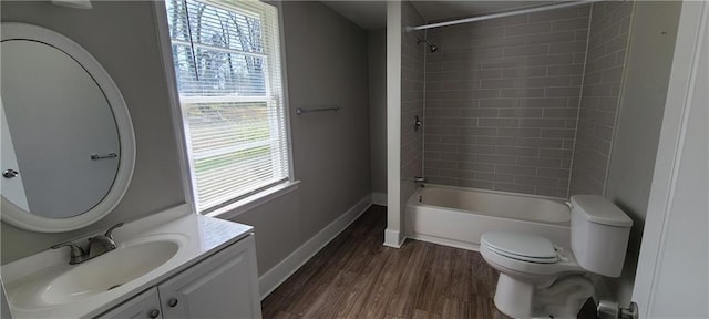 2917 Joe Jerkins Blvd, Austell, GA 30106 - full bathroom featuring wood finished floors, vanity, bathtub / shower combination, baseboards, and toilet