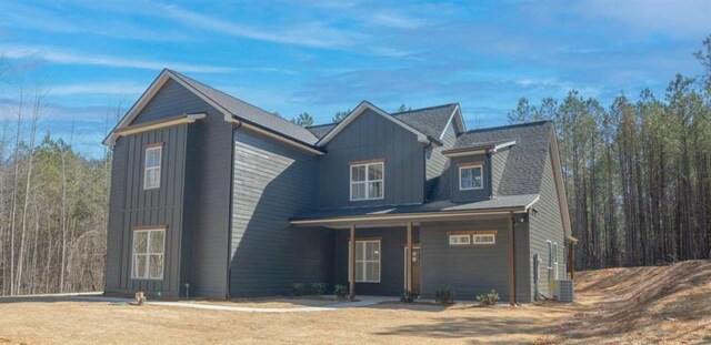 1250 Hays Mill Rd, Carrollton, GA 30117 - view of front of home featuring board and batten siding, a porch, and cooling unit