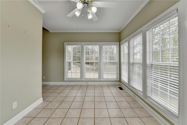 3426 Olivia Grace Way, Dacula, GA 30019 - unfurnished sunroom featuring crown molding, tile patterned flooring, plenty of natural light, and baseboards