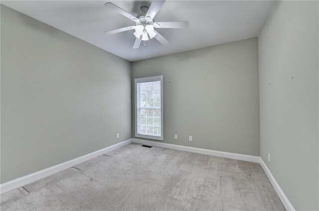 3426 Olivia Grace Way, Dacula, GA 30019 - carpeted spare room with baseboards and a ceiling fan