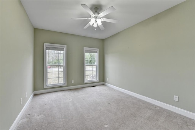3426 Olivia Grace Way, Dacula, GA 30019 - spare room with carpet flooring, baseboards, and a ceiling fan