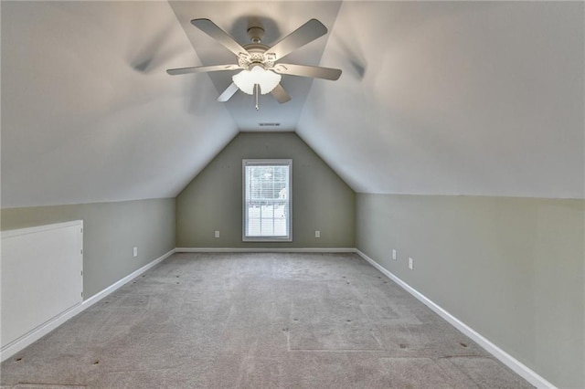 3426 Olivia Grace Way, Dacula, GA 30019 - additional living space with carpet floors, vaulted ceiling, a ceiling fan, and baseboards