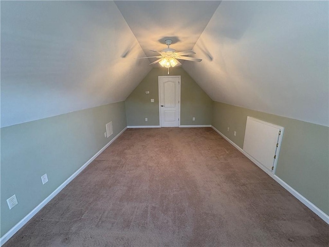 3426 Olivia Grace Way, Dacula, GA 30019 - additional living space with ceiling fan, vaulted ceiling, baseboards, and carpet