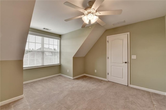 3426 Olivia Grace Way, Dacula, GA 30019 - additional living space with ceiling fan, carpet floors, vaulted ceiling, and baseboards