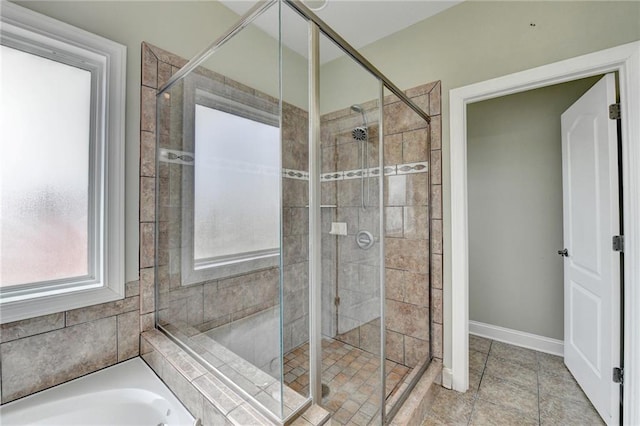 3426 Olivia Grace Way, Dacula, GA 30019 - full bath featuring a stall shower, a bath, baseboards, and tile patterned flooring