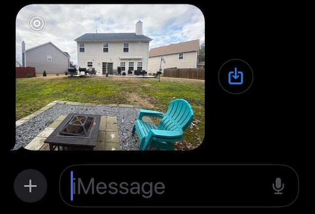 exterior space with a fire pit, a lawn, and a patio