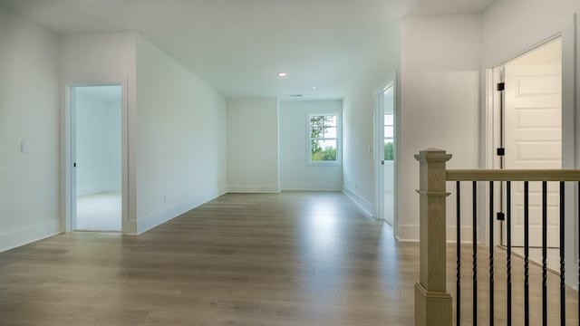 1514 Gatekeeper Ter, Marietta, GA 30066 - empty room with wood finished floors, baseboards, and recessed lighting