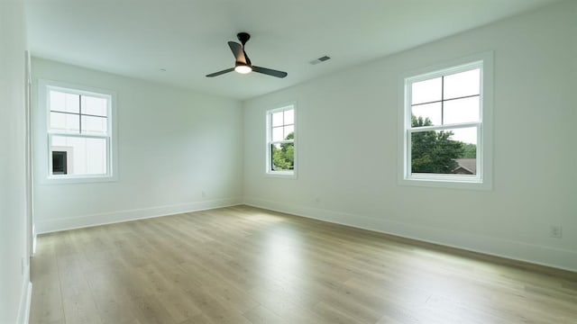 1514 Gatekeeper Ter, Marietta, GA 30066 - spare room with baseboards, light wood-type flooring, and a ceiling fan