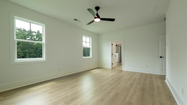 1514 Gatekeeper Ter, Marietta, GA 30066 - unfurnished bedroom with light wood-style floors, baseboards, and a ceiling fan