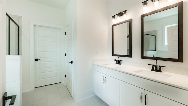 1514 Gatekeeper Ter, Marietta, GA 30066 - full bath with double vanity, an enclosed shower, tile patterned flooring, and baseboards