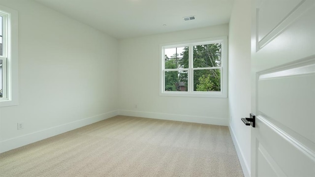 1514 Gatekeeper Ter, Marietta, GA 30066 - spare room with baseboards and light carpet
