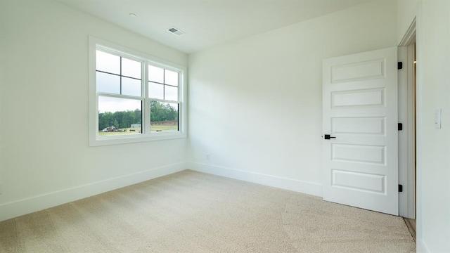 1514 Gatekeeper Ter, Marietta, GA 30066 - empty room featuring light carpet and baseboards