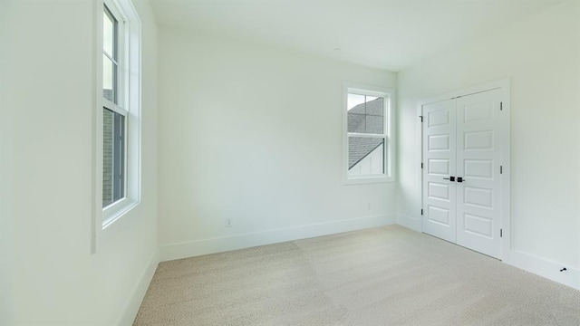 1514 Gatekeeper Ter, Marietta, GA 30066 - empty room featuring plenty of natural light, carpet, and baseboards