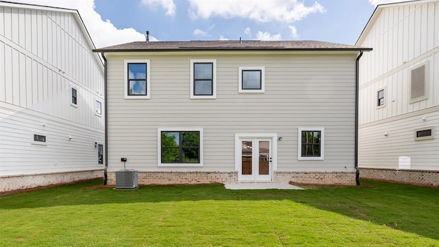 1514 Gatekeeper Ter, Marietta, GA 30066 - rear view of house featuring a yard and central AC