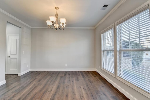 empty room featuring visible vents, crown molding, a notable chandelier, and baseboards