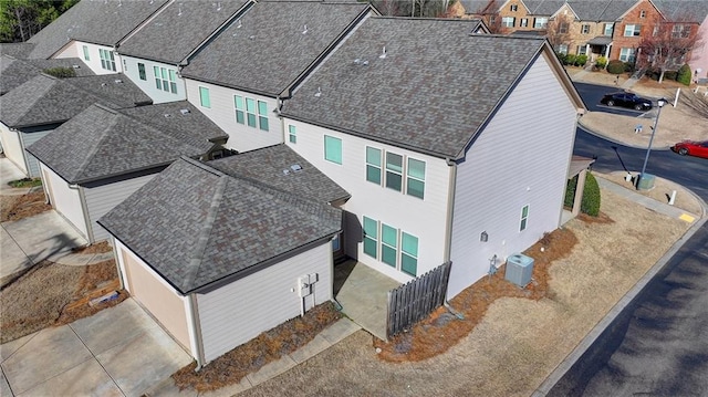 birds eye view of property with a residential view