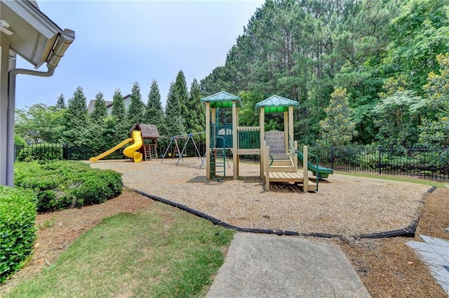 communal playground featuring fence