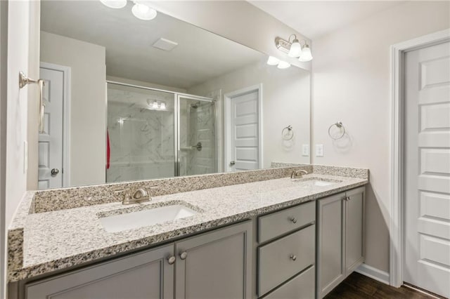121 Jim Daws, Monroe, GA 30655 - bathroom with hardwood / wood-style floors, an enclosed shower, and vanity