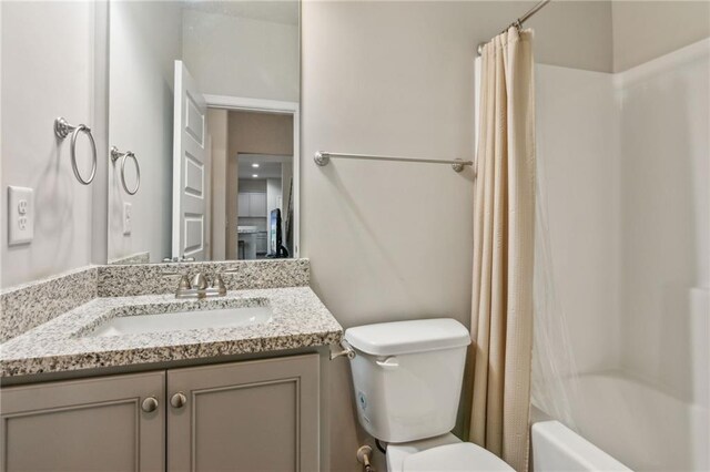 121 Jim Daws, Monroe, GA 30655 - full bathroom with shower / bath combination with curtain, vanity, and toilet
